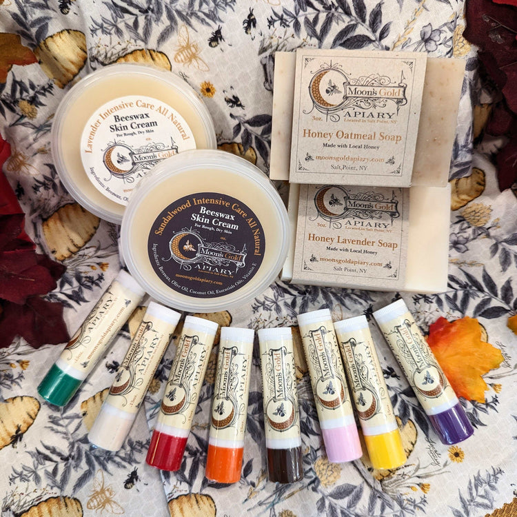 Skin Care set with beeswax skin creams, honey oatmeal and lavender soaps, and colourful botanical lip balms
