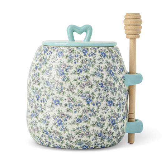 26oz Printed Ceramic Honey Pot with a cream glaze, delicate blue floral print, aqua heart-shaped lid handle and wooden dipper.