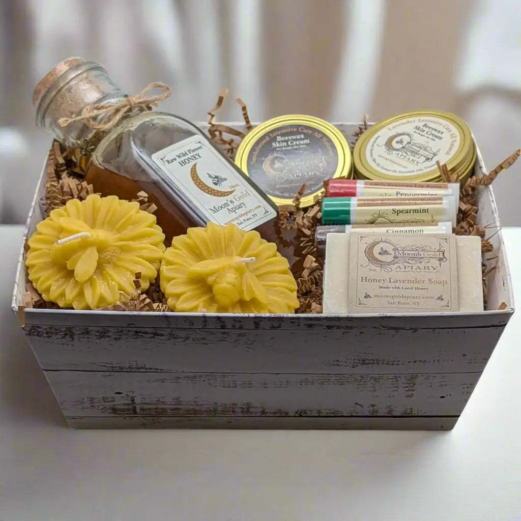 MOON'S GOLD LG GIFT BASKETS in a rustic gray wooden box with honey jar, beeswax creams, lip balms, soap and yellow candles