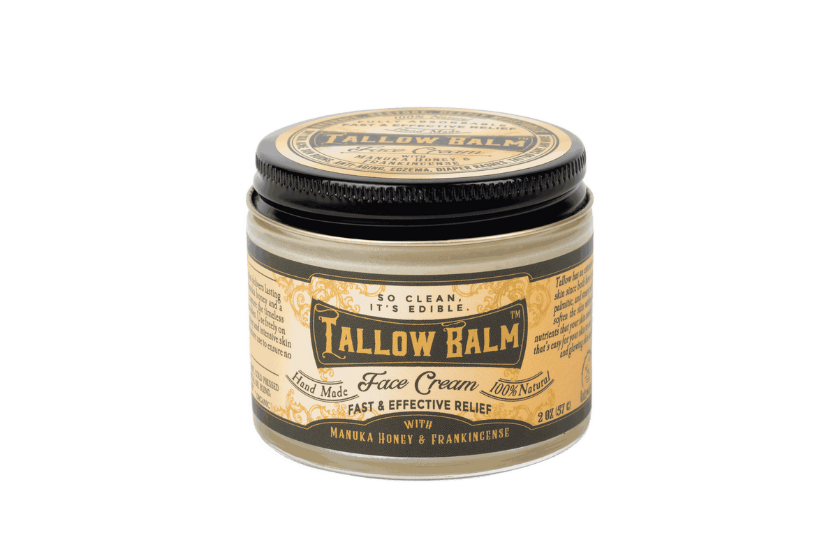 Tallow Face Cream in a clear glass jar with a black lid and vintage cream-and-gold label marked Tallow Balm