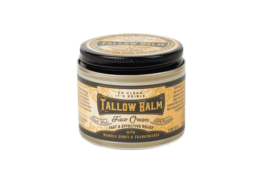 Tallow Face Cream in a clear glass jar with a black lid and vintage cream-and-gold label marked Tallow Balm