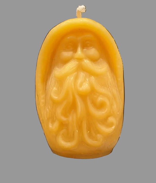 WISE MAN beeswax candle in golden yellow with a sculpted bearded face and visible wick
